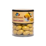 Premium mango flavored chocolate almond dragees in jar.